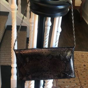Stuart Weitzman black and silver snakeskin clutch